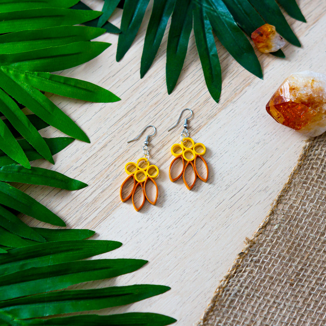 Handmade paper quilled light weight dangle earrings in deep yellow and pumpkin colors inspired by the Fall / Autumn season's colors in fish hook style.