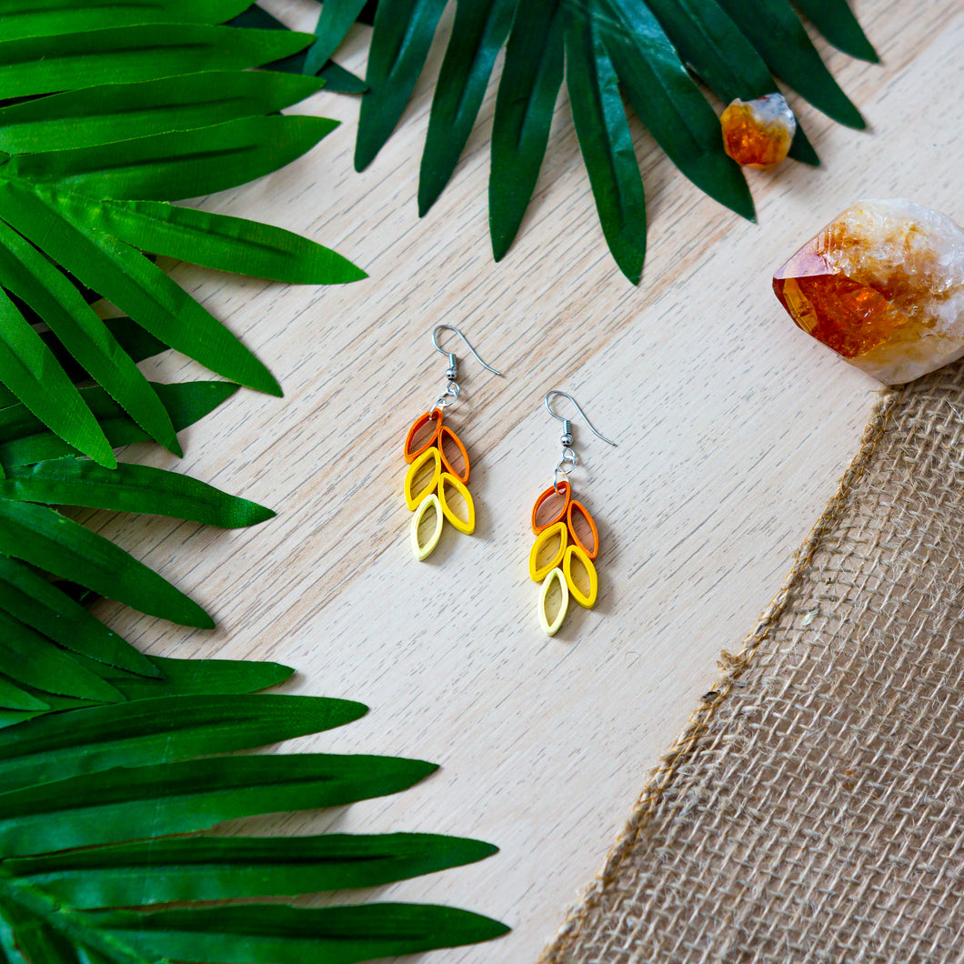Fall / autumn colors inspired drop earrings in fish hook style in multi-color with pumpkin, deep yellow and pale yellow colors..