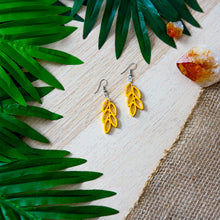 Load image into Gallery viewer, Fall / autumn colors inspired drop earrings in fish hook style in deep yellow color.
