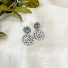 Load image into Gallery viewer, Handmade earrings with paper quilled rose stud and rhinestones in grey color.
