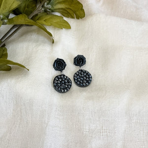 Handmade earrings with paper quilled rose stud and rhinestones in black color.